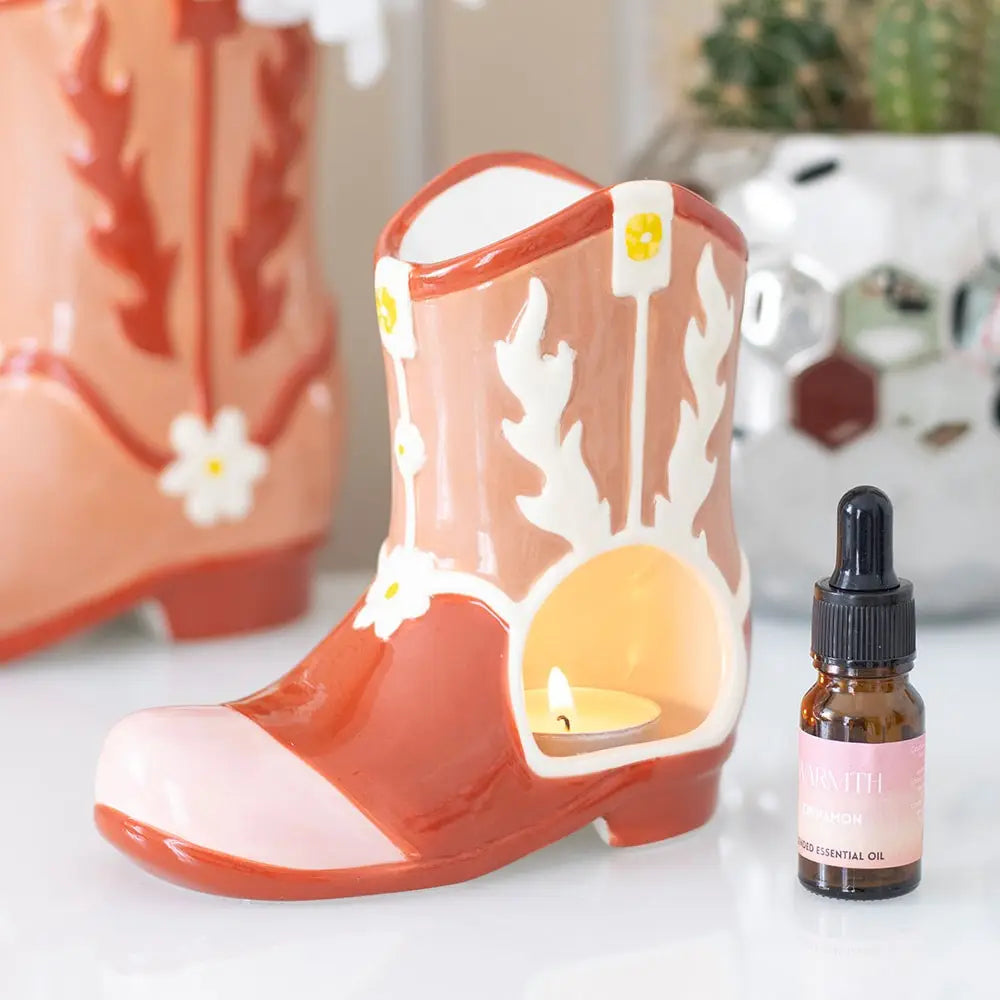 Brûleur d'huile et chauffe-cire en forme de botte de cow-boy rose